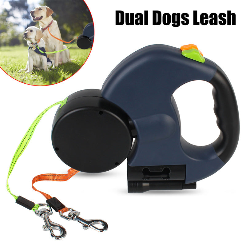 Retractable dual dog leash with ergonomic handle and two color-coded leads for walking dogs