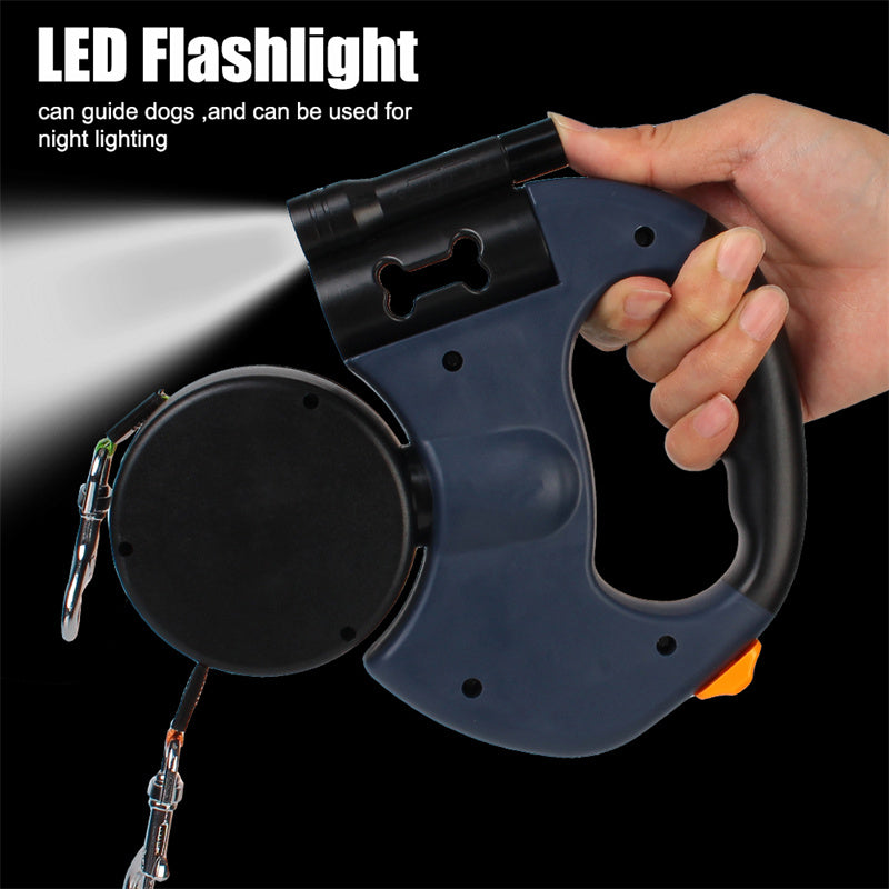 Retractable dog leash with built-in LED flashlight held in hand, night dog walking accessory