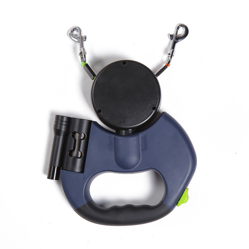 Dual retractable dog leash with ergonomic handle and built-in waste bag holder