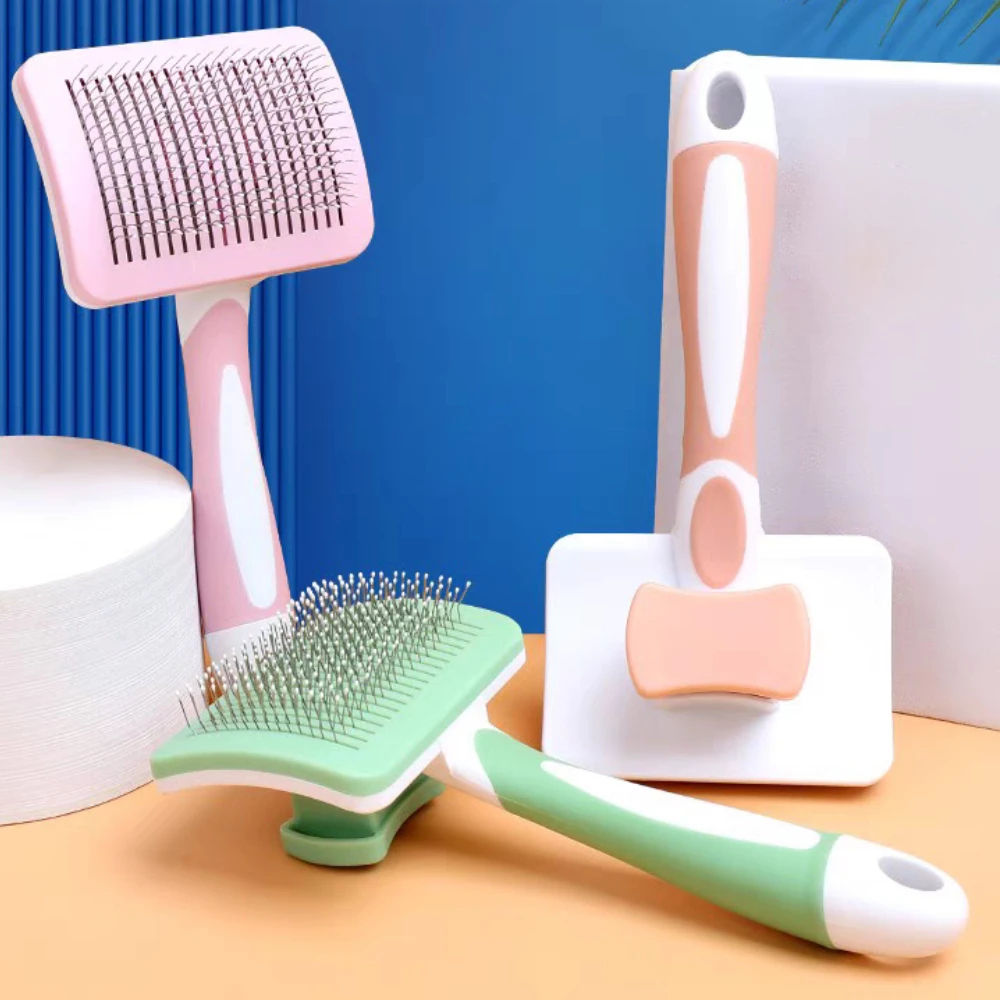 Colorful pet grooming brushes with soft bristles for dogs and cats on a table.